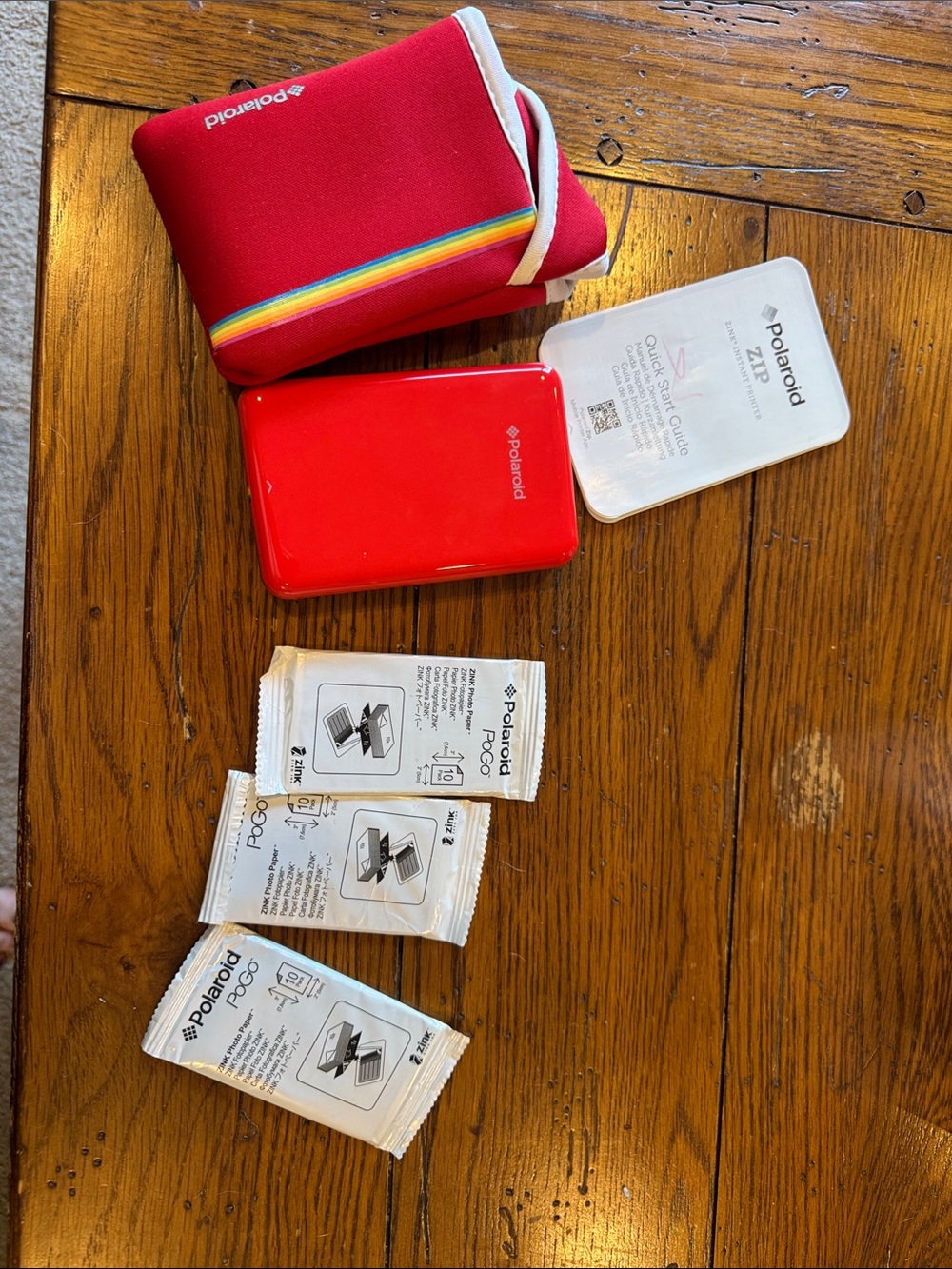 Polaroid ZIP Mobile Printer in Red with Rainbow-Strip Case
